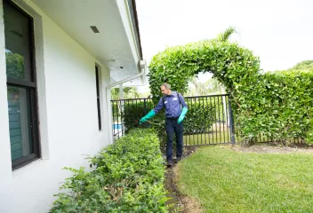tech-spraying-side-house